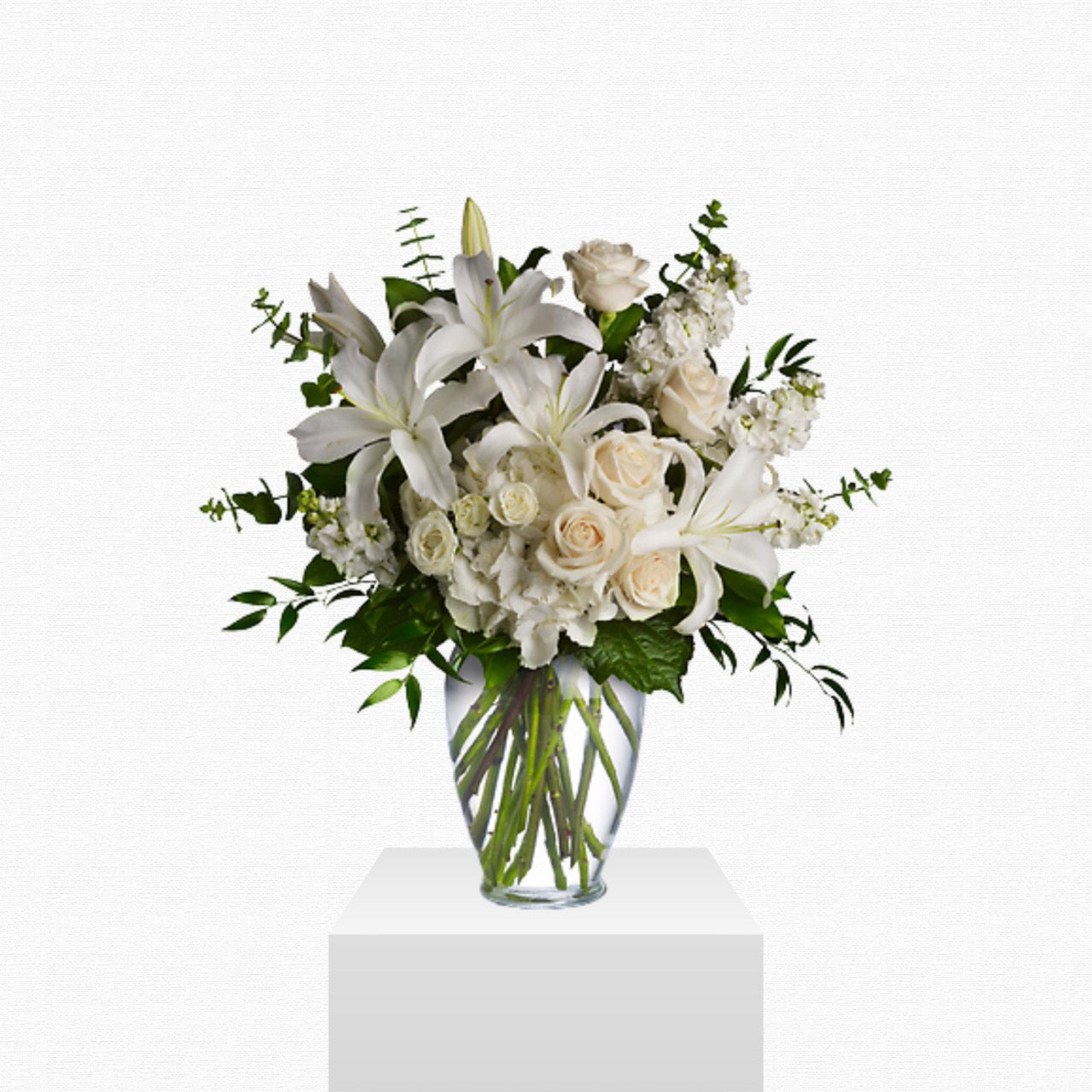 All-white sympathy flower arrangement - Angel Wings by Historic Dade City Florist