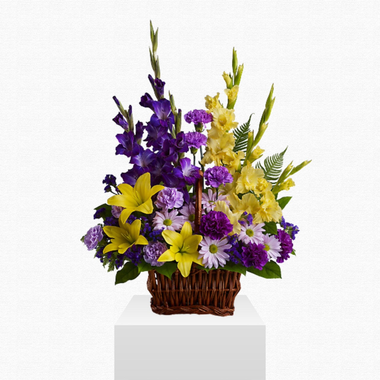 Purple and yellow mixed funeral basket by Historic Dade City Florist