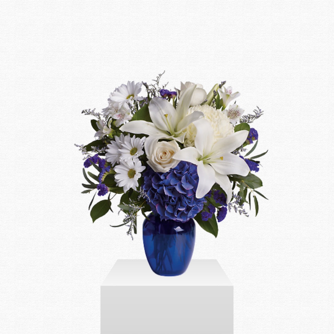 Blue and white flower arrangement - Beautiful in Blue by Historic Dade City Florist