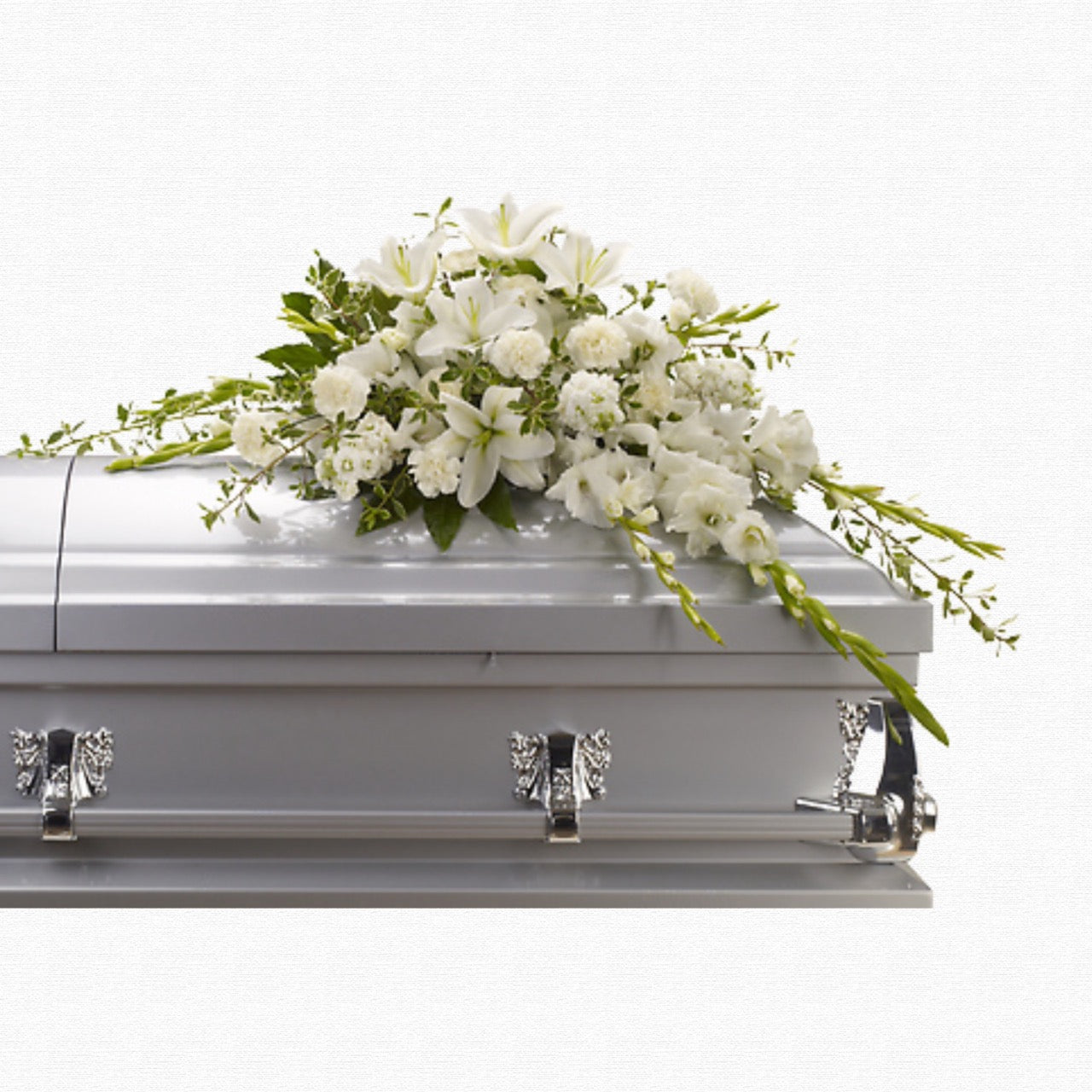 White and neutral floral casket spray by Historic Dade City Florist