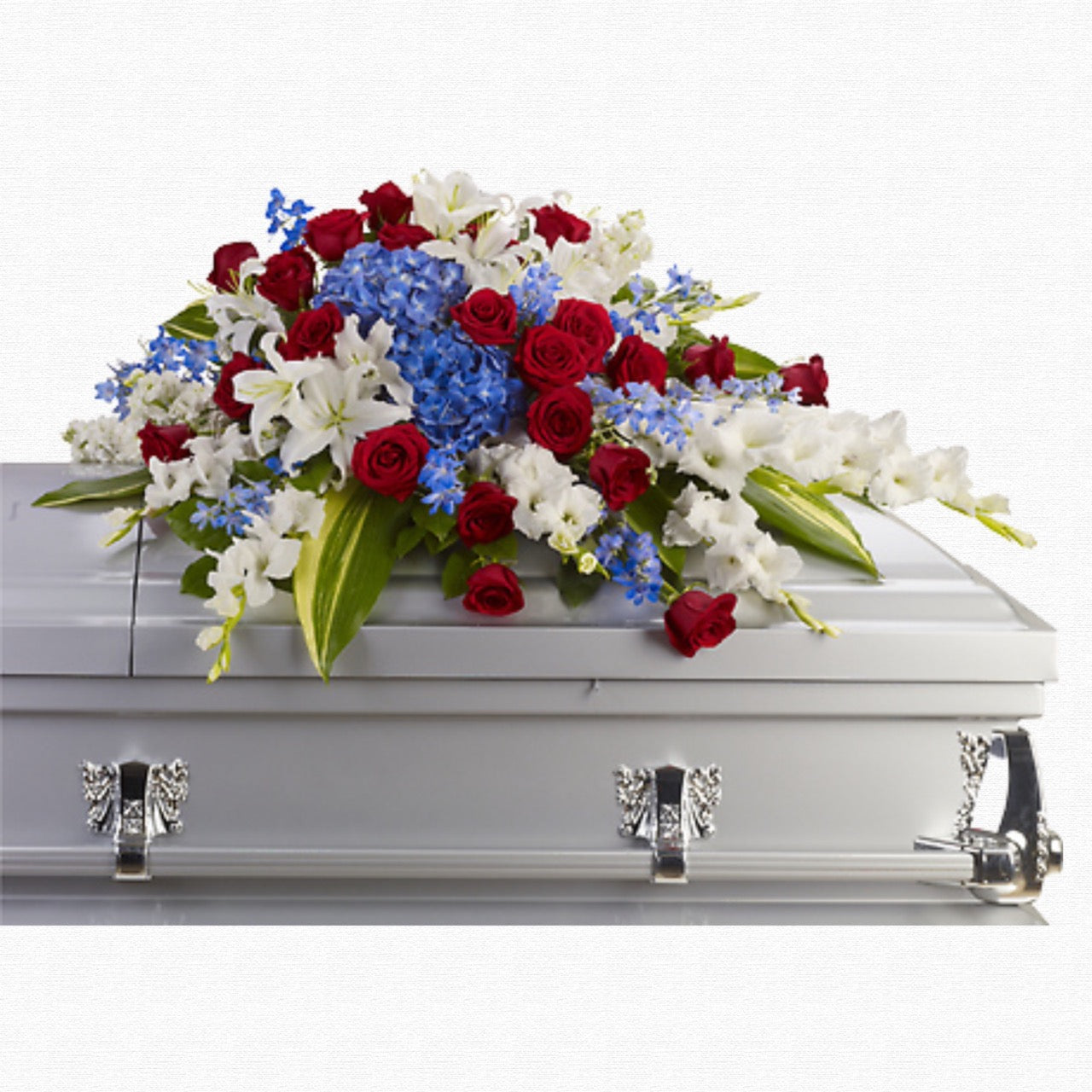 Red, white, and blue military casket spray by Historic Dade City Florist