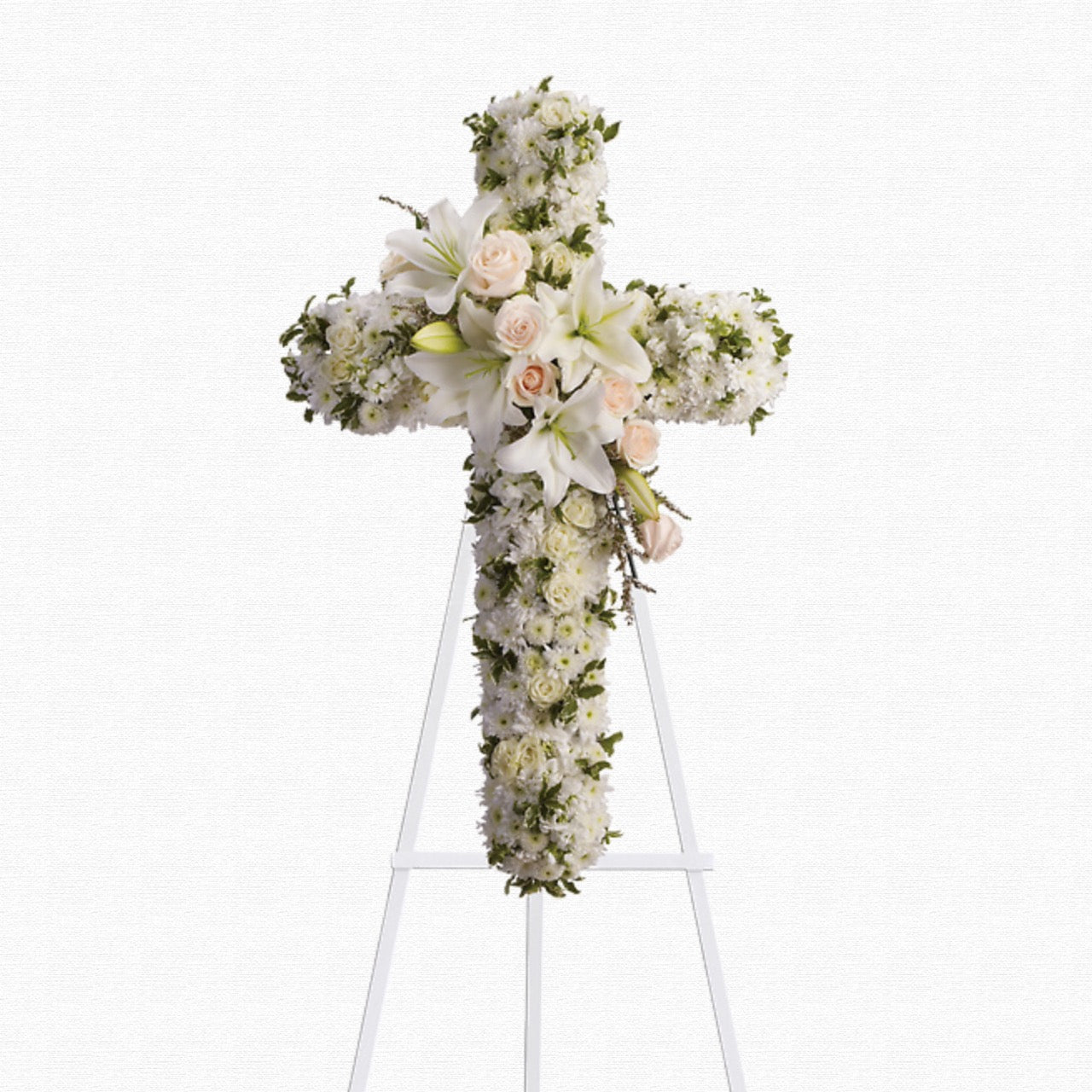 Pure white funeral cross arrangement by Historic Dade City Florist