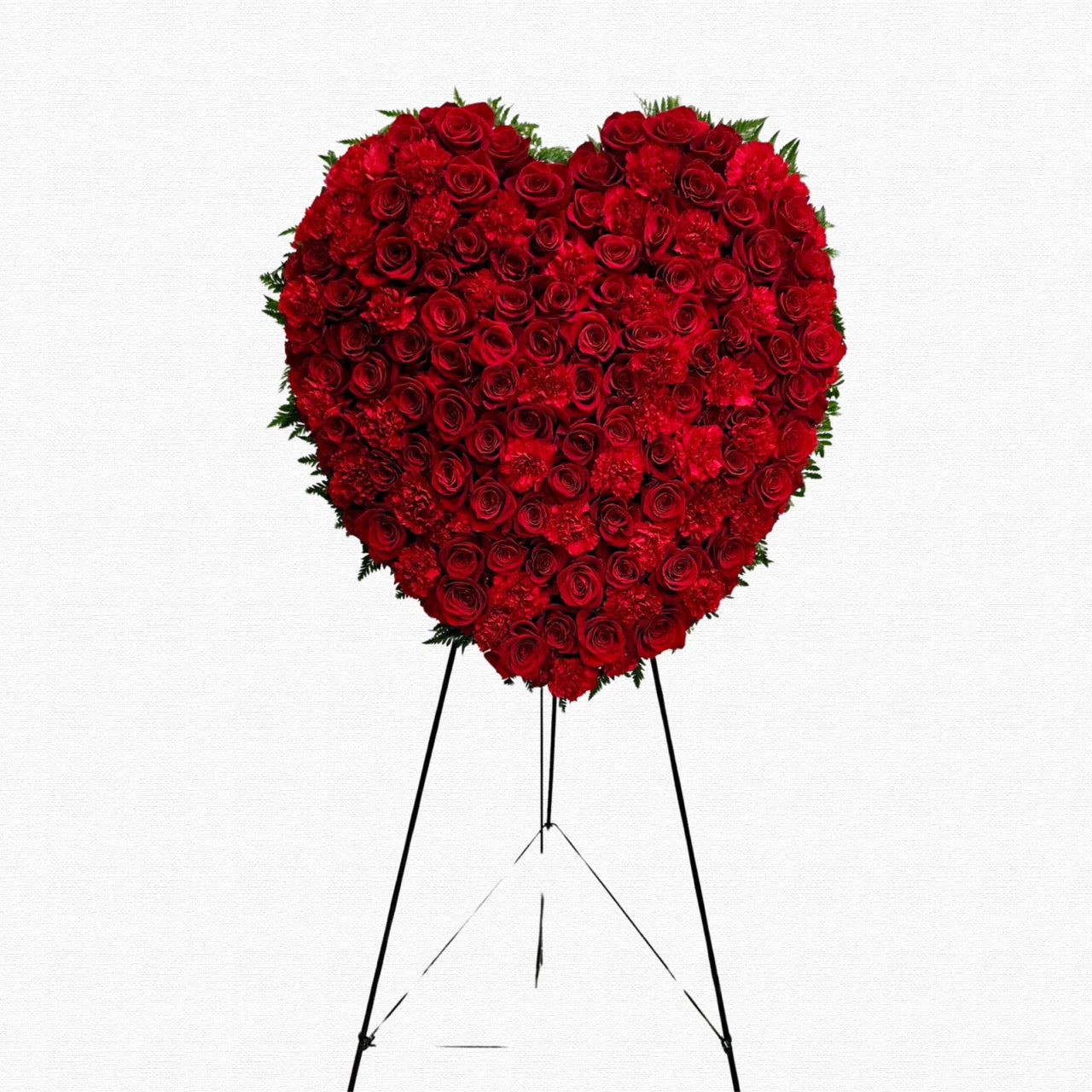 Red rose heart-shaped funeral tribute by Historic Dade City Florist