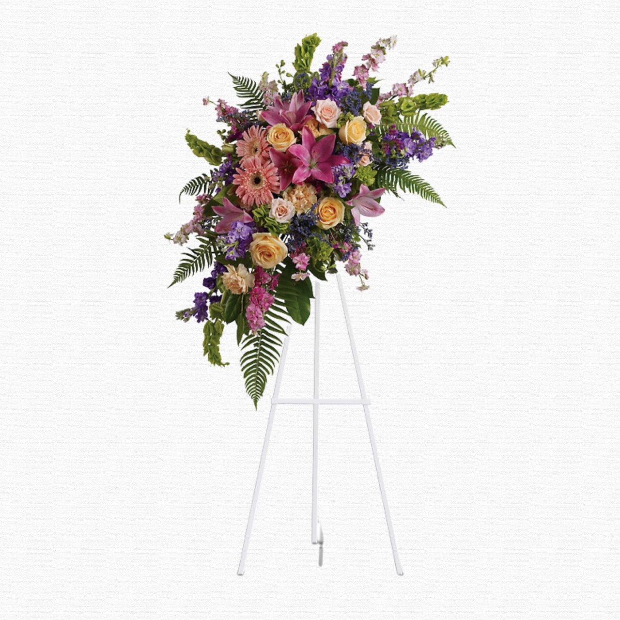 Pink and peach tropical funeral spray by Historic Dade City Florist