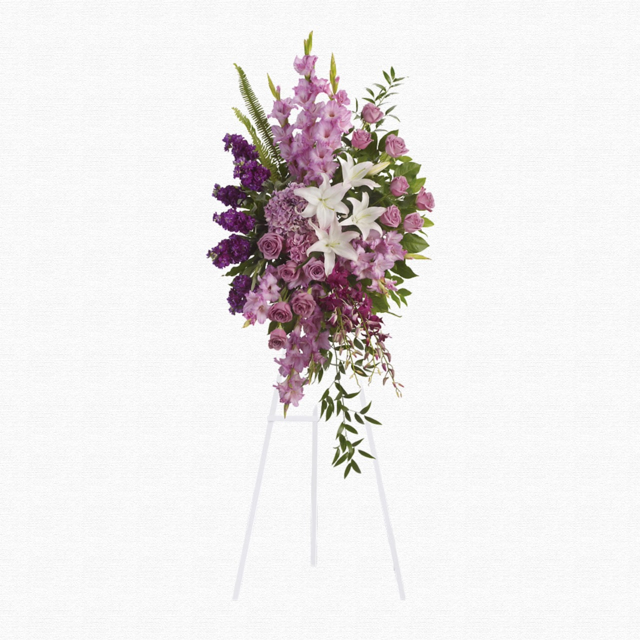 Purple and white lily funeral spray arrangement by Historic Dade City Florist