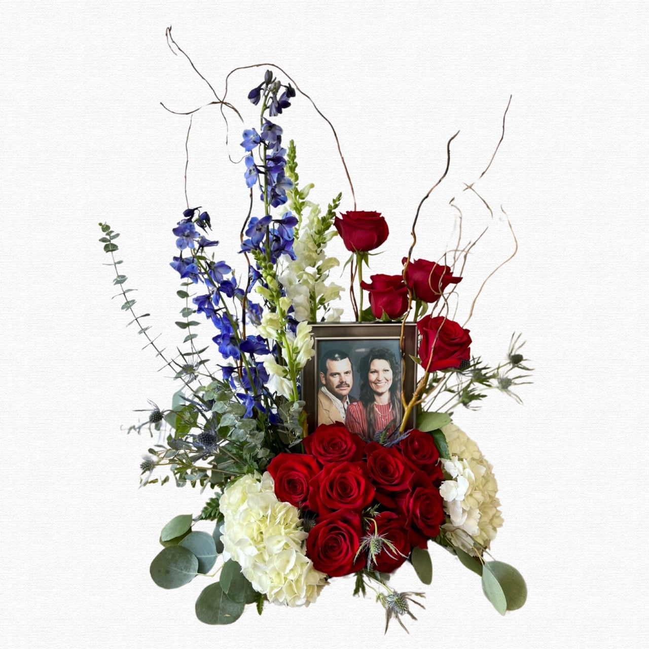 Patriotic military funeral tribute arrangement by Historic Dade City Florist