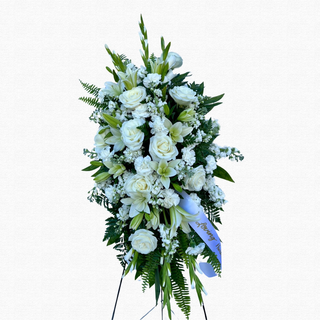 All-white traditional funeral spray by Historic Dade City Florist