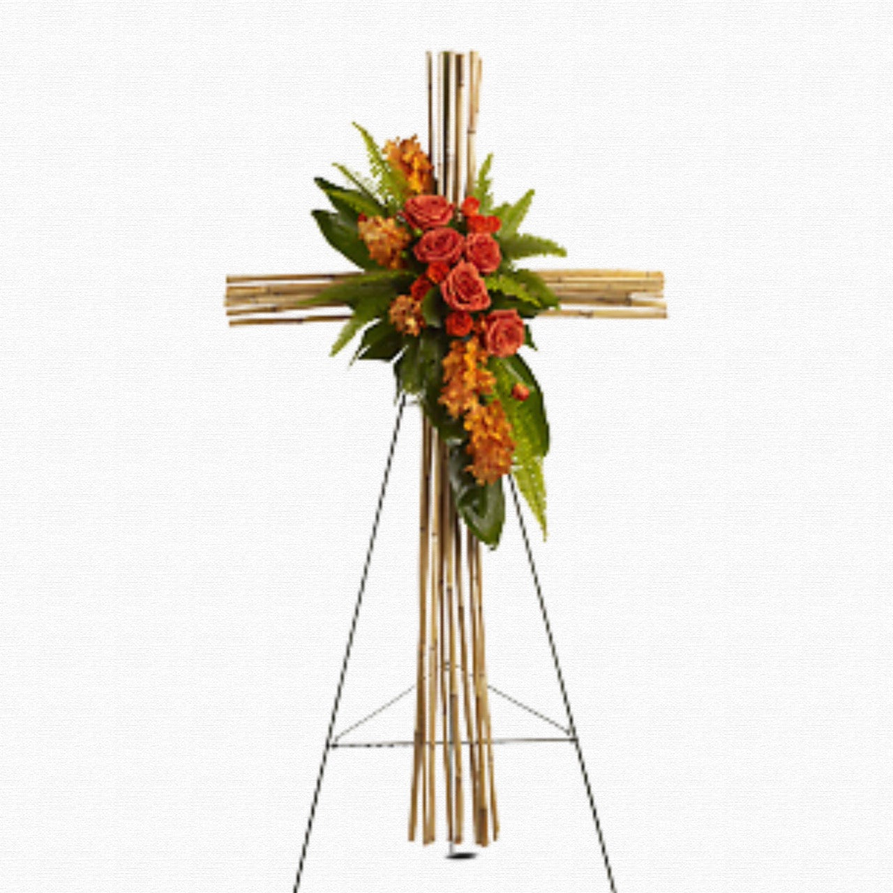 Tropical orange funeral cross arrangement by Historic Dade City Florist