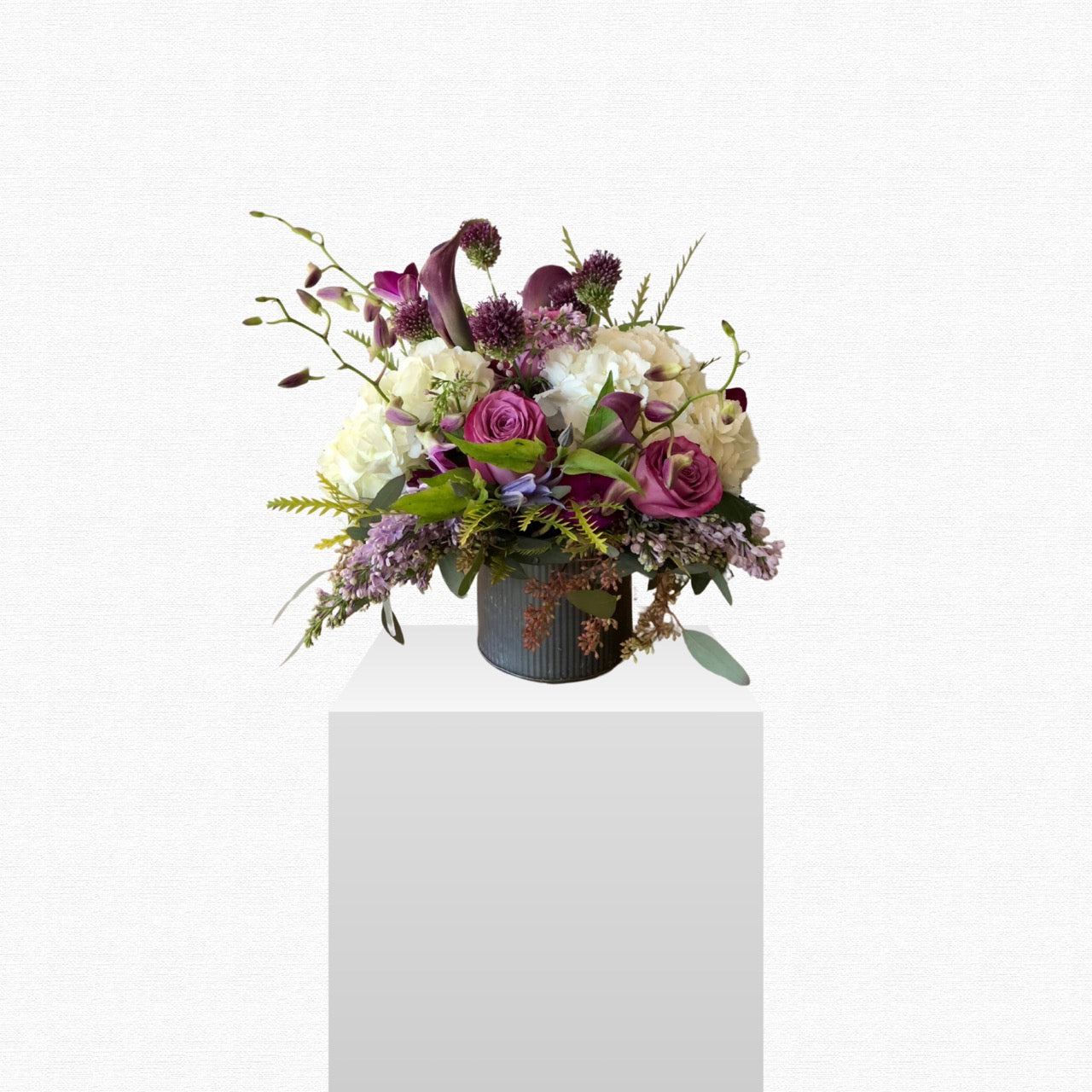 Purple and white classic flower arrangement by Historic Dade City Florist