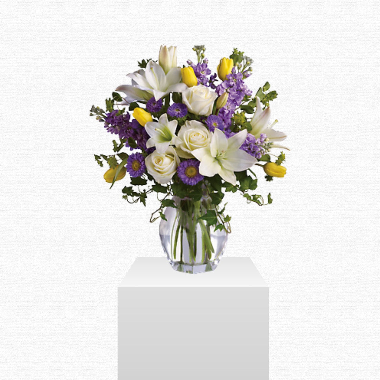 Yellow and purple spring flower arrangement - Spring Waltz by Historic Dade City Florist