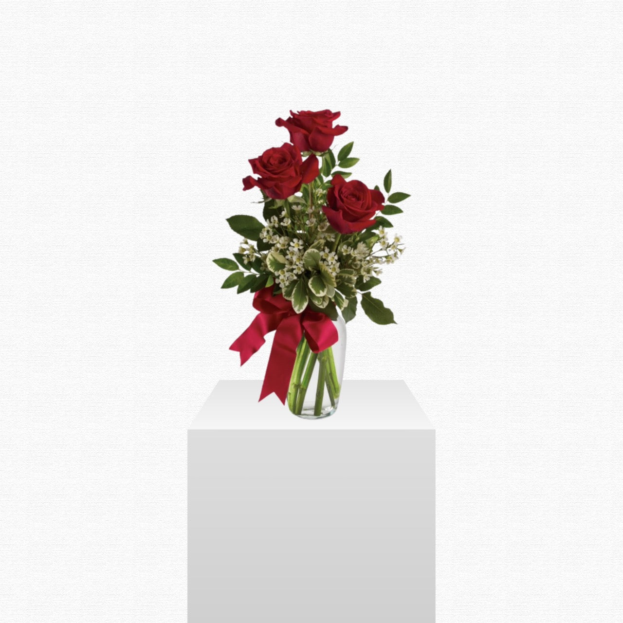 Trending tropical arrangement from Dade City's 75-year florist. White and green botanicals. Delivers to Dade City area.